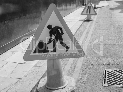 Black and white Roadworks sign