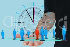 Hand holding figures with network clock