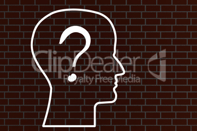 Head with question mark on a brick wall