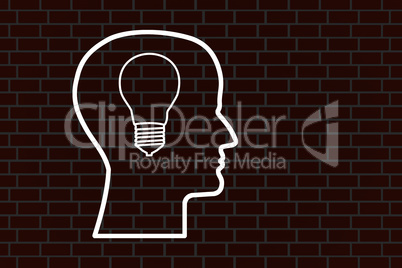 Head with bulb on a brick wall