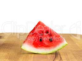 Isolated watermelon slice, cutout quarter on wooden board