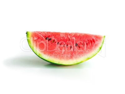 Isolated piece of watermelon with seeds visible