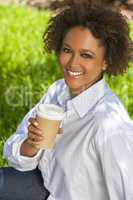 African American Woman Drinking Coffee Outside