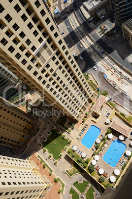 The view from skyscraper on swimming pools, Dubai, UAE