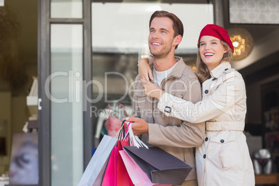 A happy couple with shopping bags