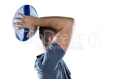 Rugby player throwing ball