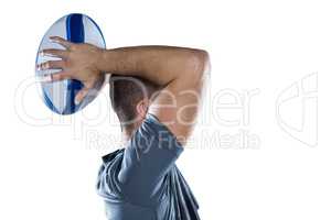 Rugby player throwing ball