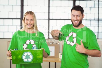 Portrait of joyful volunteers standing