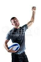 Happy rugby player punching the air