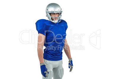 Confident American football player standing