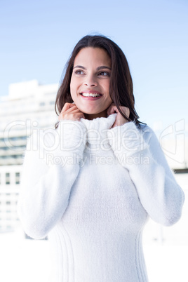 Happy pretty brunette standing