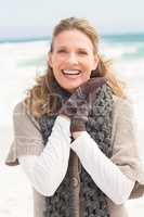 Smiling woman wearing winter clothing