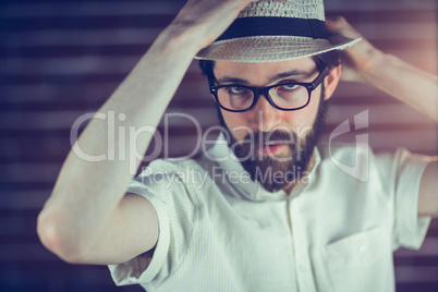 Portrait of handsome man wearing eyeglasses and hat