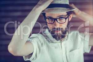 Portrait of handsome man wearing eyeglasses and hat