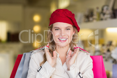 Portrait of a happy smiling woman with shopping bags