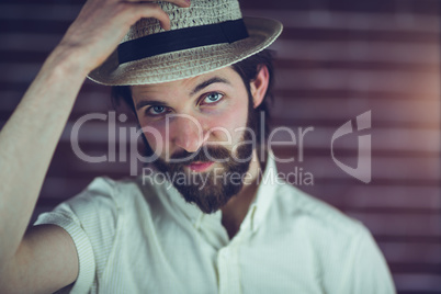 Portrait of handsome man wearing hat