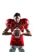 Furious American football player in red jersey holding ball