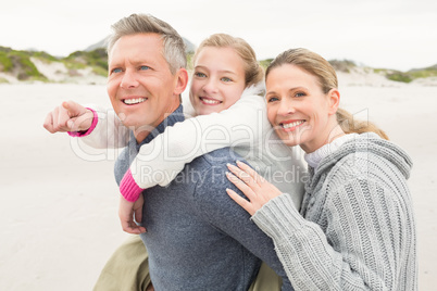 Father carrying his daughter