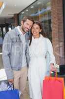 Young couple smiling while standing