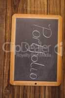 Chalkboard on table with portfolio text