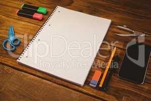 School supplies on desk with copy space