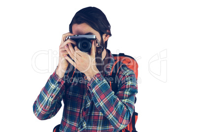 Bearded man taking a photograph