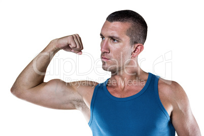 Handsome man flexing muscles