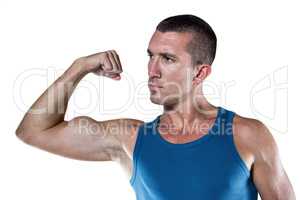 Handsome man flexing muscles