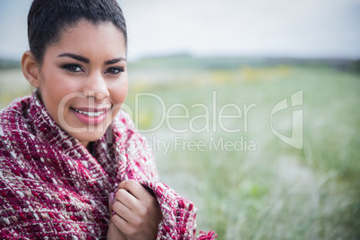 Beautiful woman wrapped up in warm clothing
