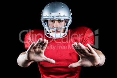 Portrait of American football player defending