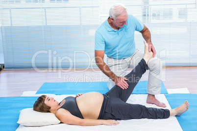 Physiotherapist messaging to pregnant woman