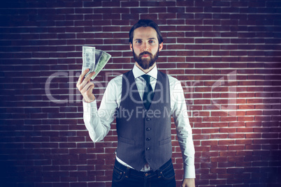 Portrait of man holding money