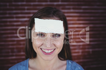 Pretty brunette with paper on head Pretty brunette with paper on head