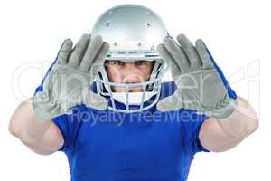 Portrait American football player defending