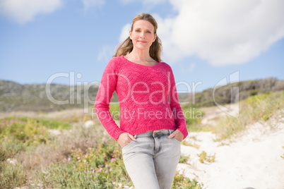 Smiling woman wearing a lovely pink top