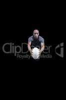 High angle view of rugby player holding ball