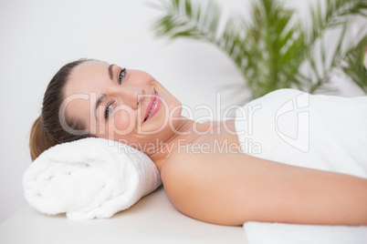 Happy woman in a bed