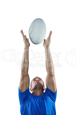 Rugby player catching ball