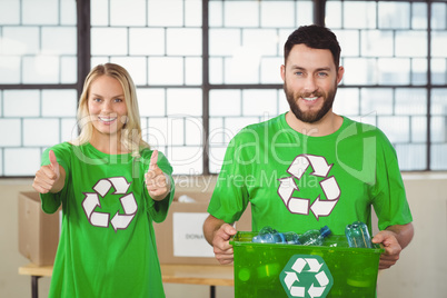 Portrait of man holding container