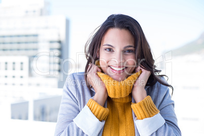 Smiling beautiful brunette looking at camera