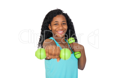 Woman exercising using dumbbells