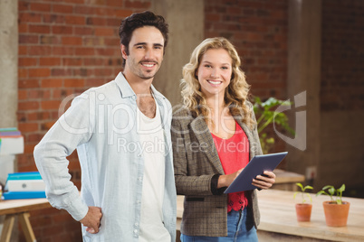 Portrait of confident smiling business people in office