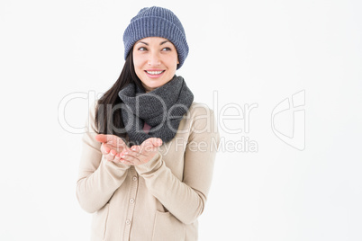 Smiling brunette presenting her hands