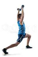 Man in sportswear exercising with dumbbells