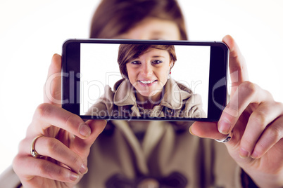Cute woman using her phone