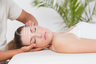 Woman receiving neck massage