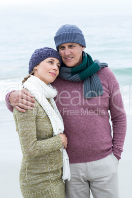 Smiling happy couple hugging each other Smiling happy couple hugging each other