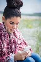 Beautiful woman using her smartphone