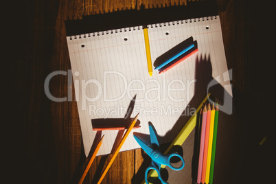 School supplies on desk with copy space