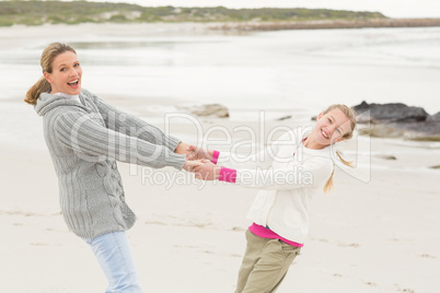 Mother and daughter playing together